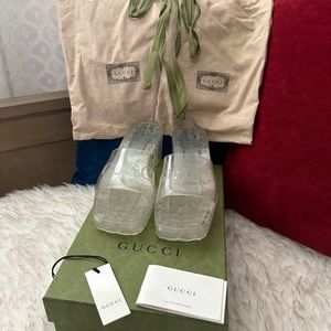 GUCCI CLEAR RUBBER SLIDES